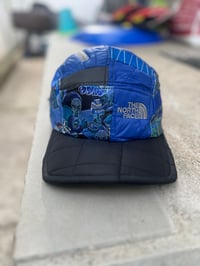 Image 1 of NF DOOM 5-Panel Glow Reflect Puffer Brim