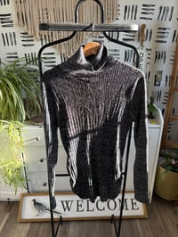  Metallic turtleneck sweater