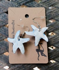 Image 3 of Blue and white starfish