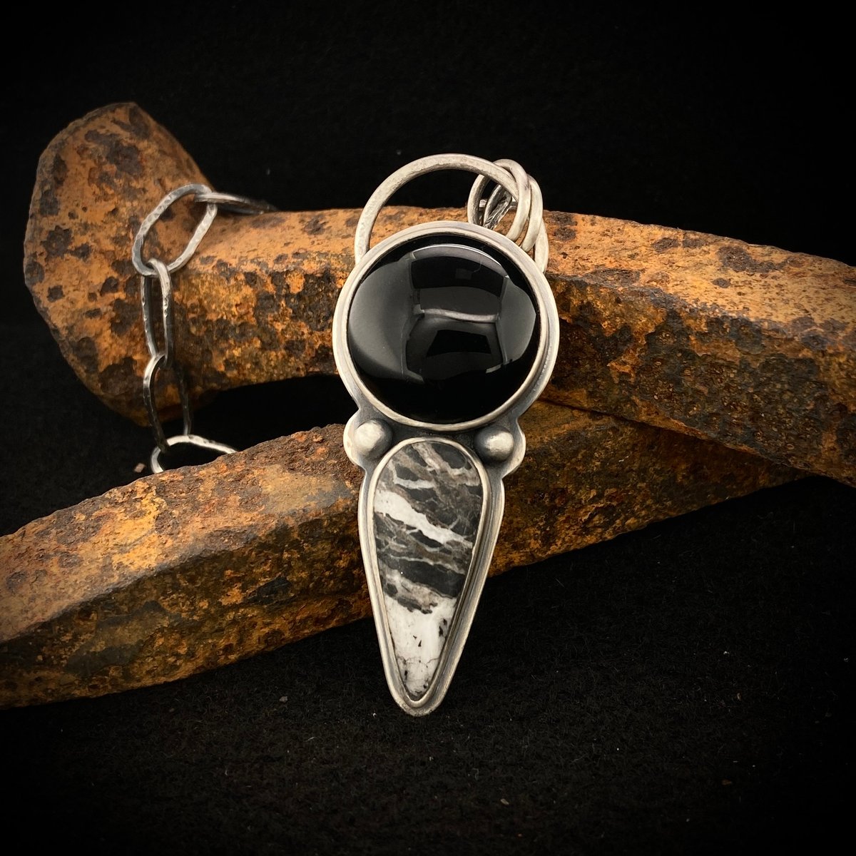 White Buffalo and Black Onyx Pendant