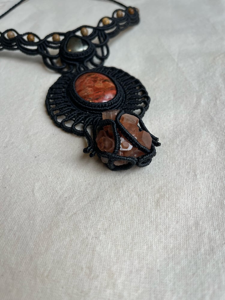 Image of Macrame necklace with pyrite, brecciate and aragonite stone