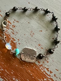 Image 12 of faceted gemstone and sterling silver medallion bracelet