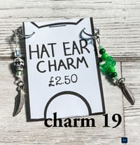 Image 19 of Ed’s hat ear charms