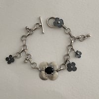 Image 1 of black petals bracklet