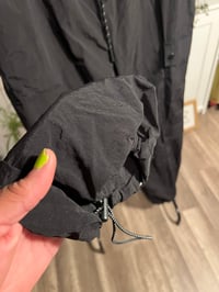 Image 2 of black drawstring parachute pants