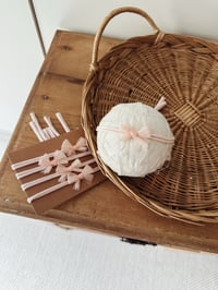 Image 1 of Blush bow