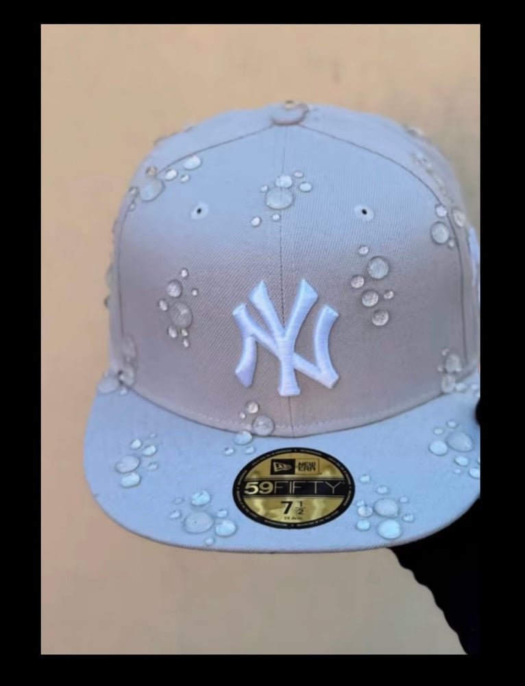 Image of custom rain drop hats