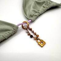 Image 2 of Fossilized Bamboo Heart Lock Bikini Charm