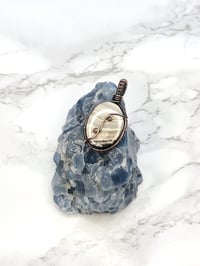 crazy lace agate pendant in copper