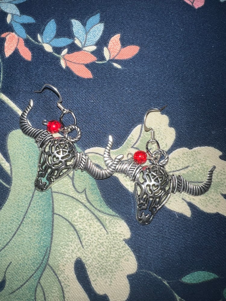 Image of Silver animal skull earrings 