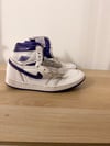 Purple and white air jordans 