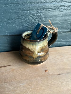 Image of M50 tiny mug, water glaze white melty lip