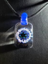 Image 1 of Uv reactive flower pendant 🌼