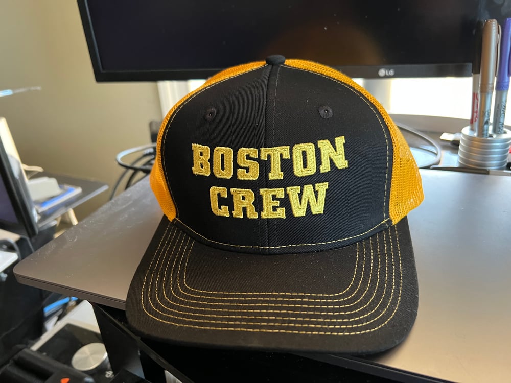 Black and Gold Trucker Snapback Cap with Boston Crew logo