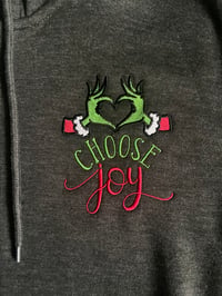 Image 2 of HOLIDAY GEAR* "Choose Joy" Grinch heart hands embroidered on Hoodies or Joggers