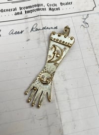 Image 1 of Brass Moon and Sun Glove Pendant