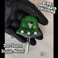 Image 2 of Green Hello Kitty UFO Clip