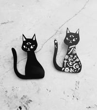 Image 2 of Black Kitty •  2” acrylic pin • Two variants