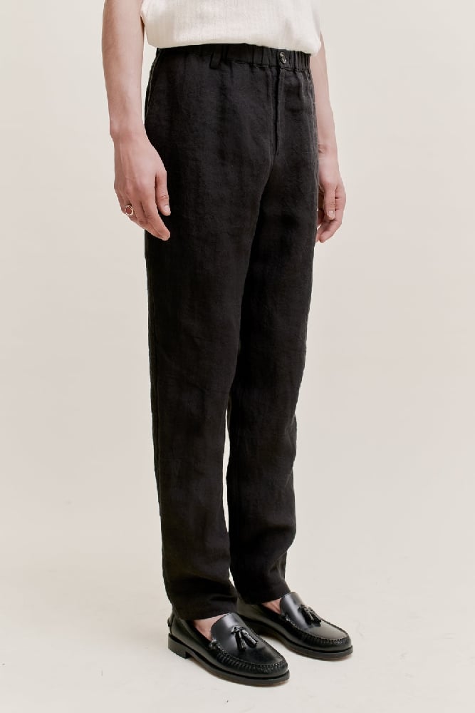 Image of A KIND OF GUISE ELASTICATED WIDE TROUSERS MYSTIC BLACK