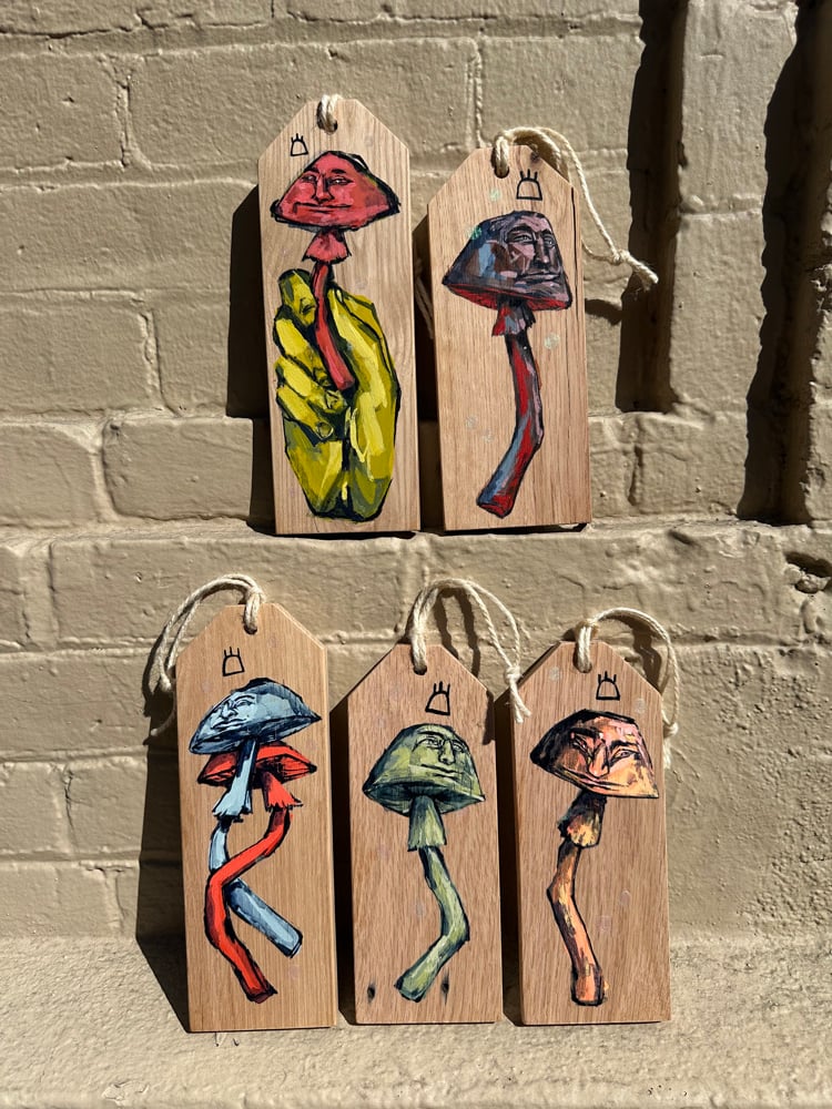 Image of Orange and blue mushrooms tag