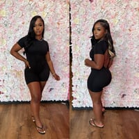 Image 1 of black shorts bodysuit. 