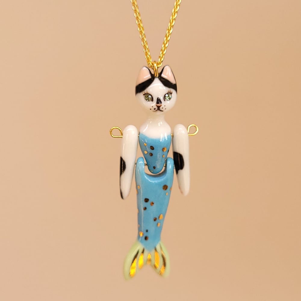 Image of Cow Cat Porcelain & Gold Vermeil Articulated Purrmaid Pendant