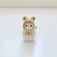 Image 1 of Orange cat with frog ponchos coat ceramic figurine