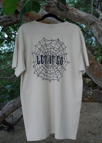 Image 1 of LET IT GO- tan t shirt