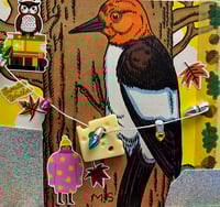 Christmas Woodpecker and its Favorite Cheese