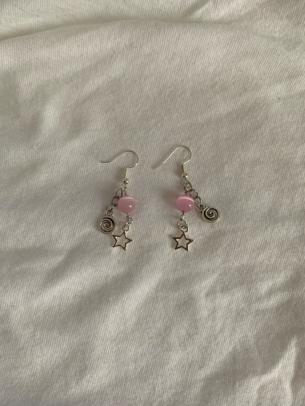 "swirly star" earrings 