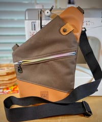 Image 1 of Brown and Faux Leather Traveler Sling