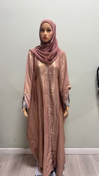 Image 3 of Korean shimmer fabric Flared sleeve abaya rose gold it comes with a matching scarf 