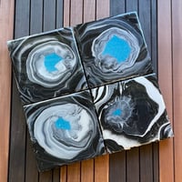 Image 1 of Painted Coasters (set of four) black and white with turquoise glitter