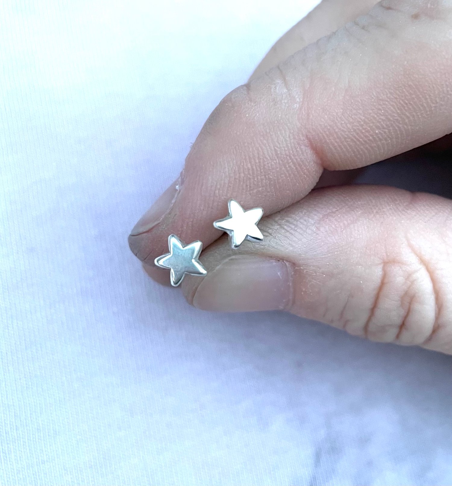 Image of Handmade sterling silver star stud earrings. Tiny star studs 925 silver.