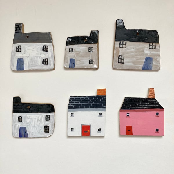 Image of Pottery and wood houses