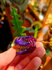 Image 1 of Royal jelly mini T-Rex skull pendant with uv reactive teeth 💜 
