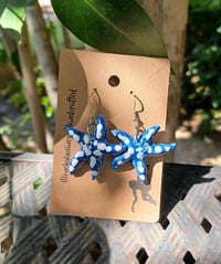 Image 1 of Blue and white starfish