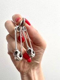 Image 1 of SAFETY PIN SKULL EARRINGS 