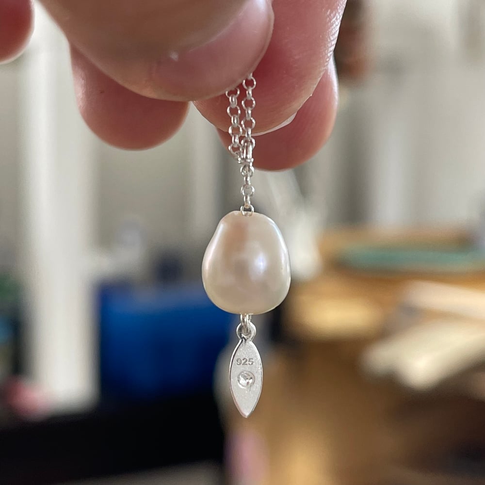 Image of unique pearl charm