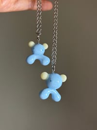 Image 1 of glow ear gumo necklace