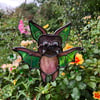 Iridescent Green and Purple Bat