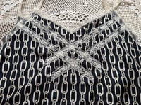 Image 2 of chain with crossed lace