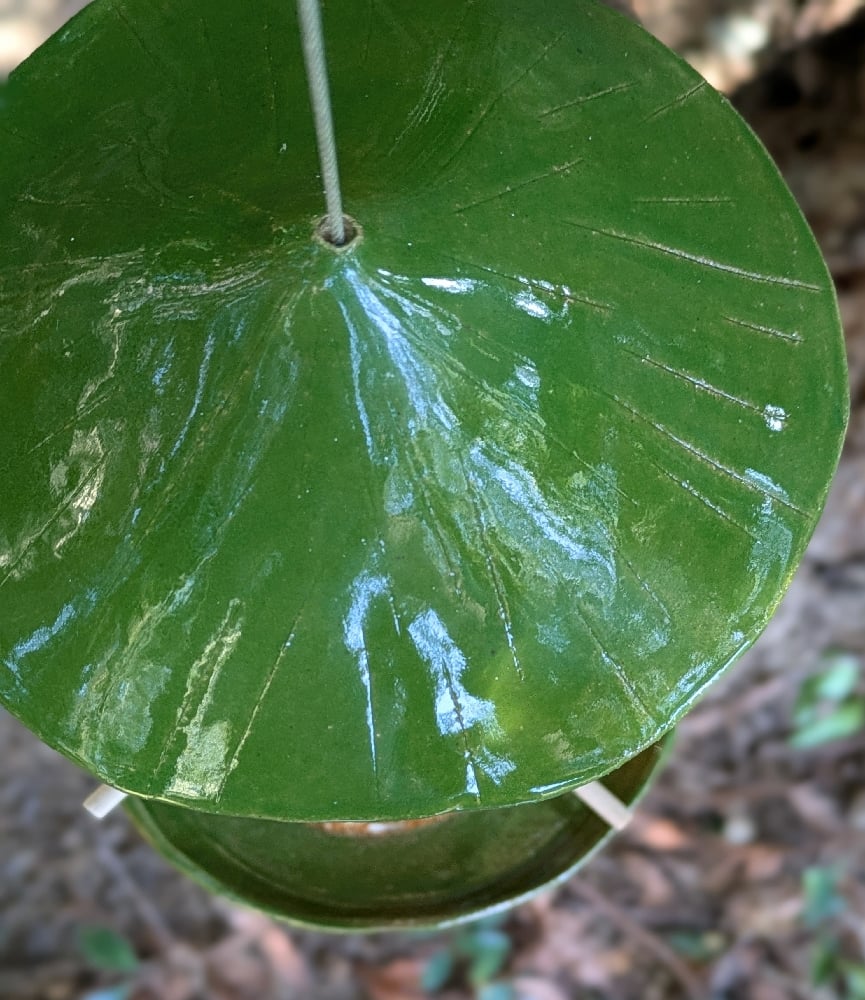 Image of handmade green and brown tall bird feeder 