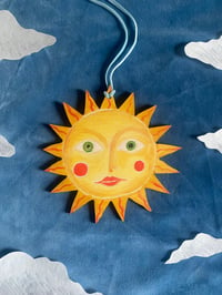 Hand painted wooden sun charm