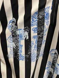 Image 2 of Hockey referee drip. 