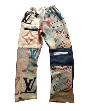 Image of Nwn- Woven monogram Straight legged Utility Trousers with Knit Mock denim and Work grade Khaki