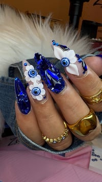 Image 1 of Blue ojitos