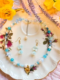 Image 2 of Blue Lagoon with locket heart charm 