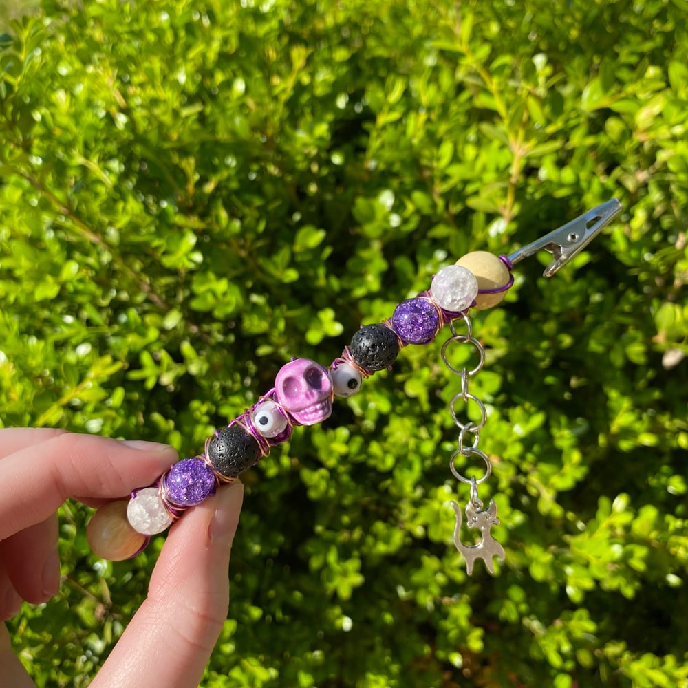 Image of violet graves roach clip 