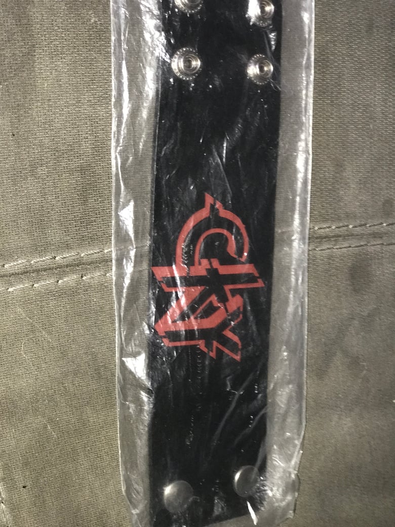 Image of Cky wrist band. Still in packaging